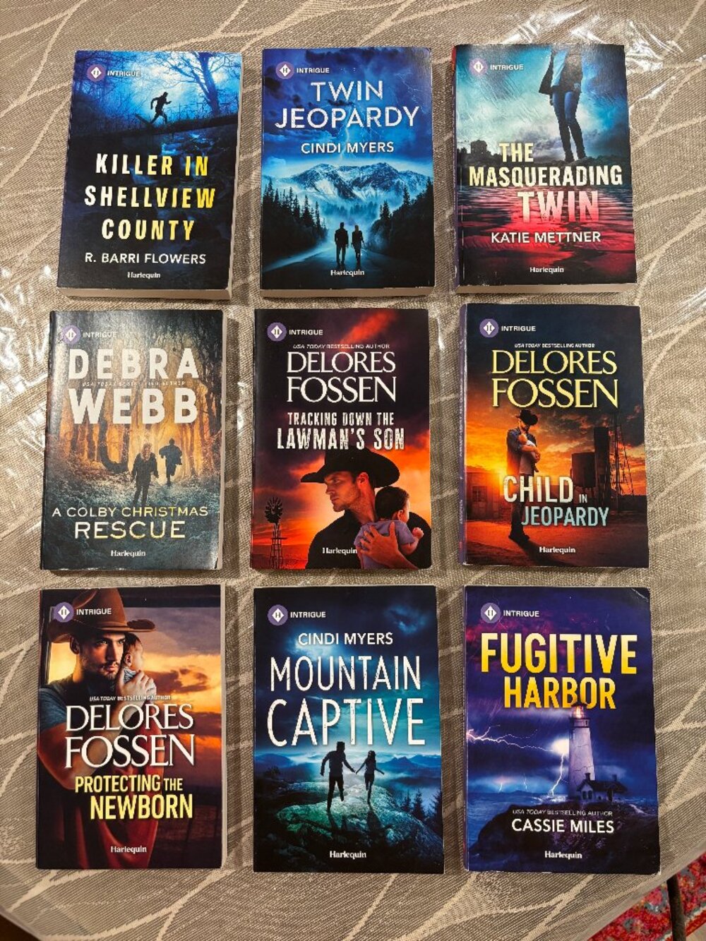 Purging Mom's Books: 9 Harlequin Intrigue Paperbacks